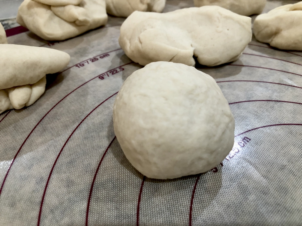 Rolling a ball for the German Pretzel Buns Recipe